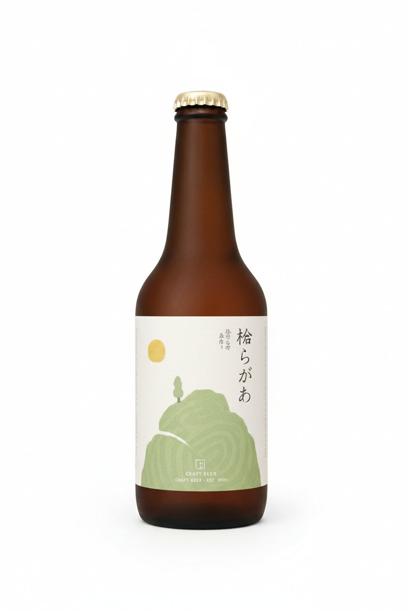 A brown glass bottle of sake with a cream-colored label featuring a green illustration of a frog and Japanese text, topped with a gold cap, set against a plain white background.
