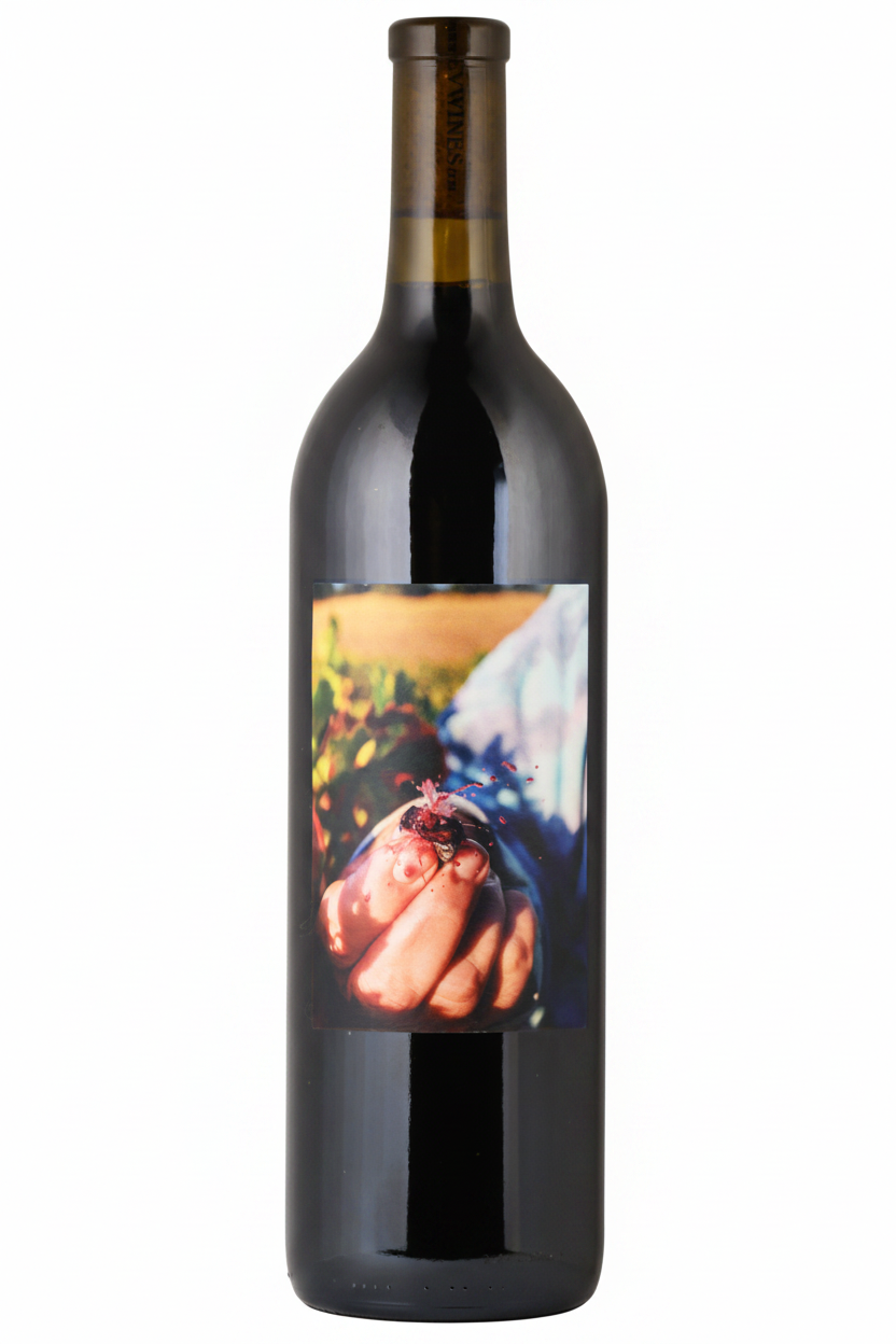Red wine bottle with a colorful label on a white background